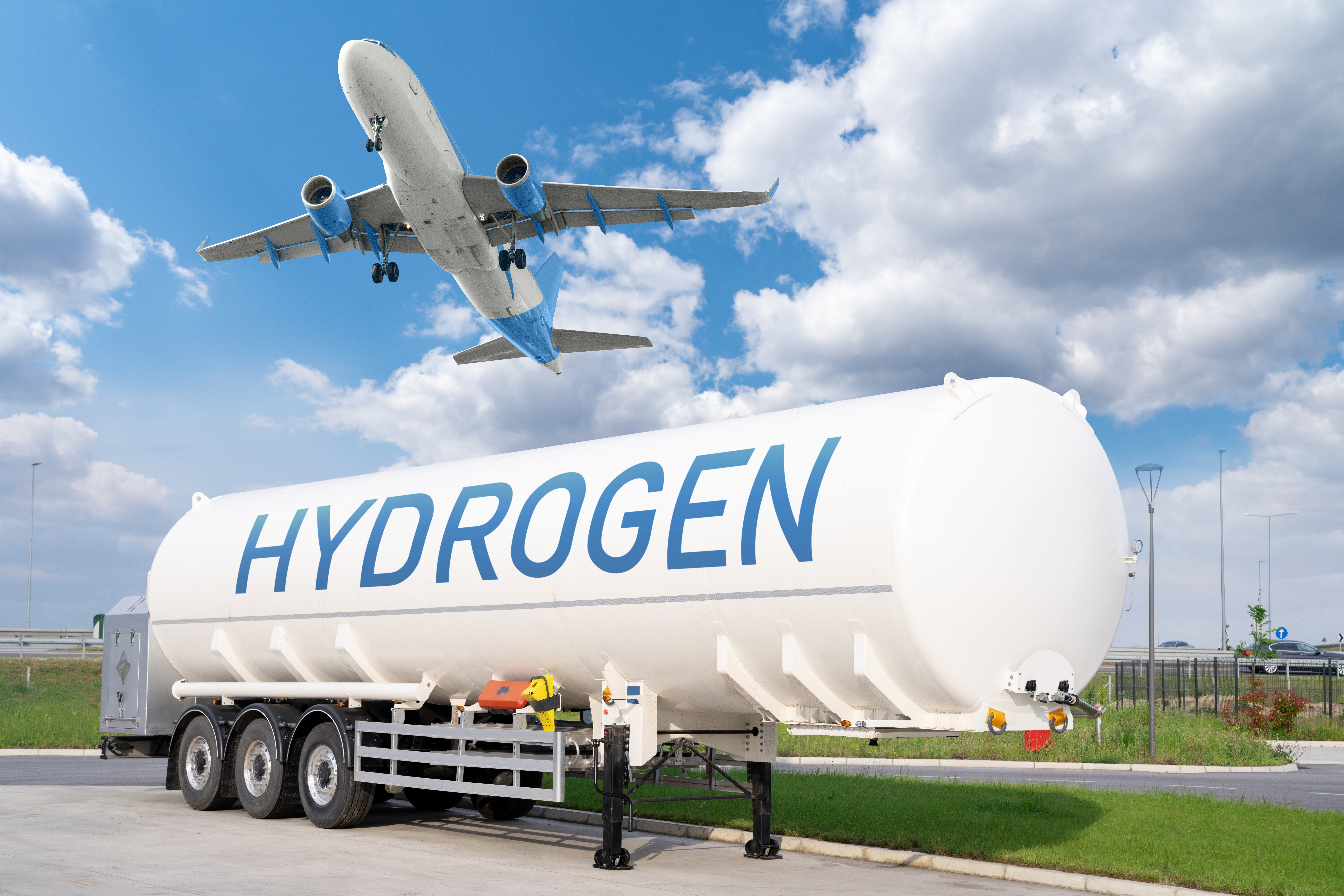 Aeroplane taking off on sunny day. Hydrogen fuel tank in foreground